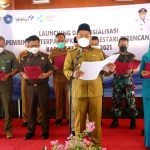 TIM PENGGERAK PKK BERSAMA FORKOPIMDA KABUPATEN GRESIK DEKLARASIKAN KOMITMEN BERSAMA TERHADAP PROGRAM PEMBINAAN TERPADU PKM SEHAT LESTARI TERENCANA.